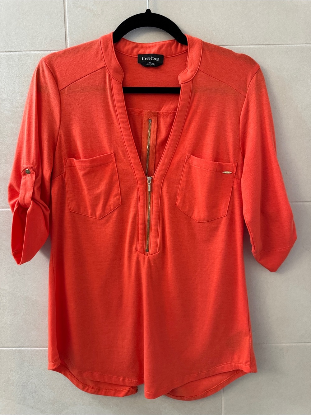 bebe Coral Zip-Pocket Split Neck Tunic